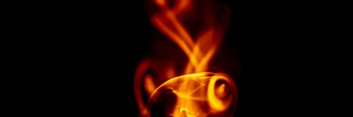 Wide abstract golden lines representing flow and continuity